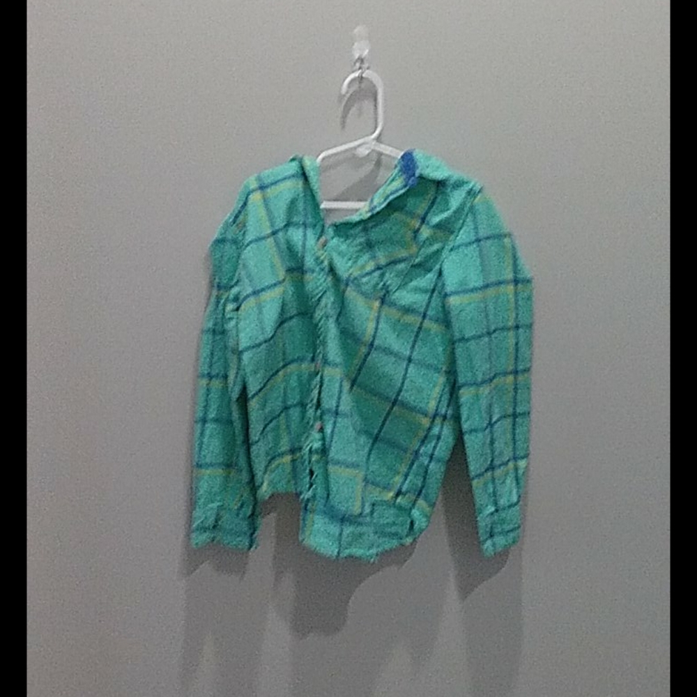A blue and green and a little bit of yellow shirt